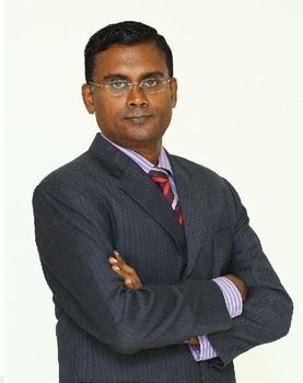 Dr Arul K