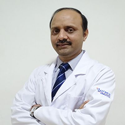 Dr Manik Sharma